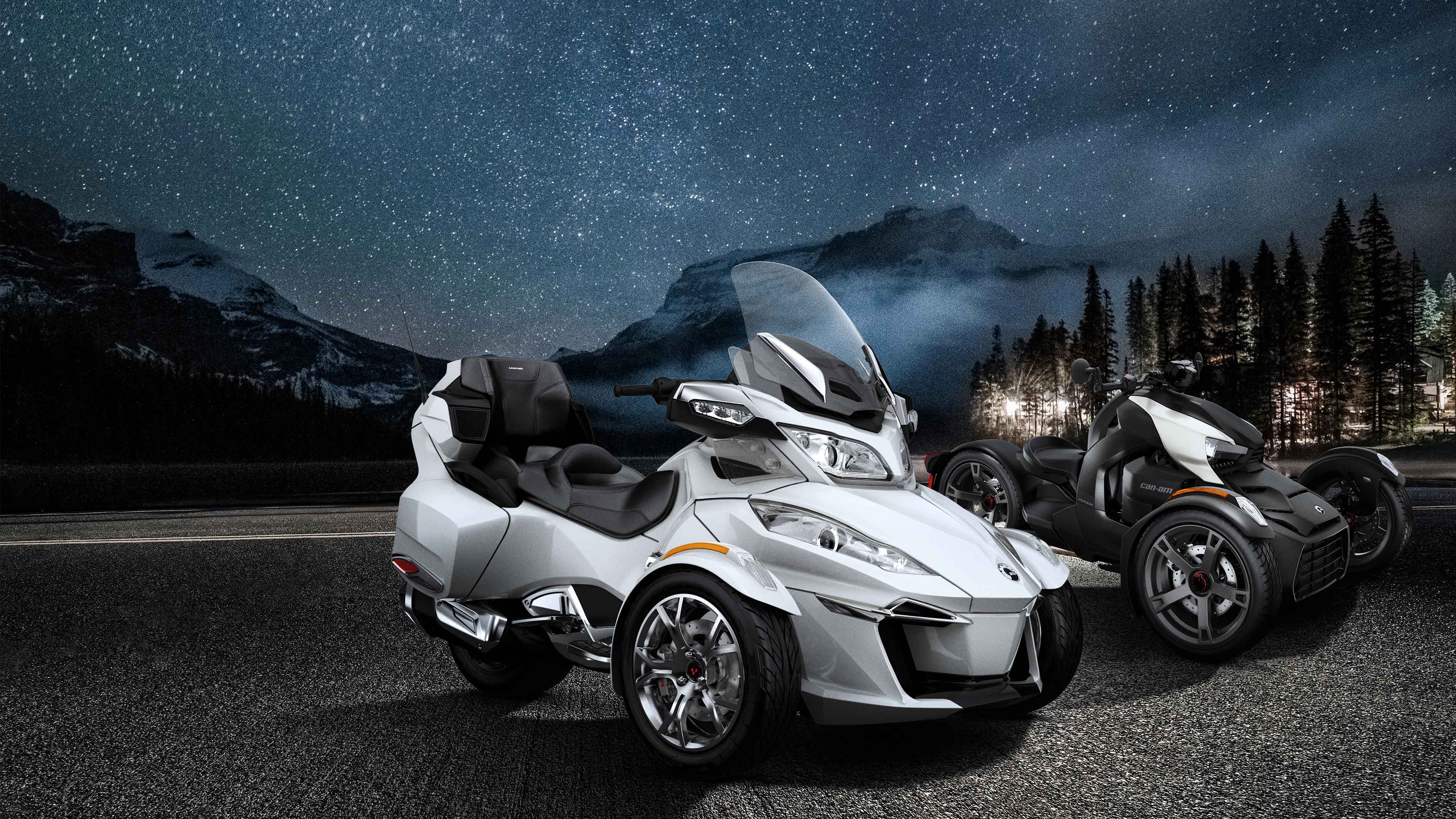 2 Can-Am vehicles at night